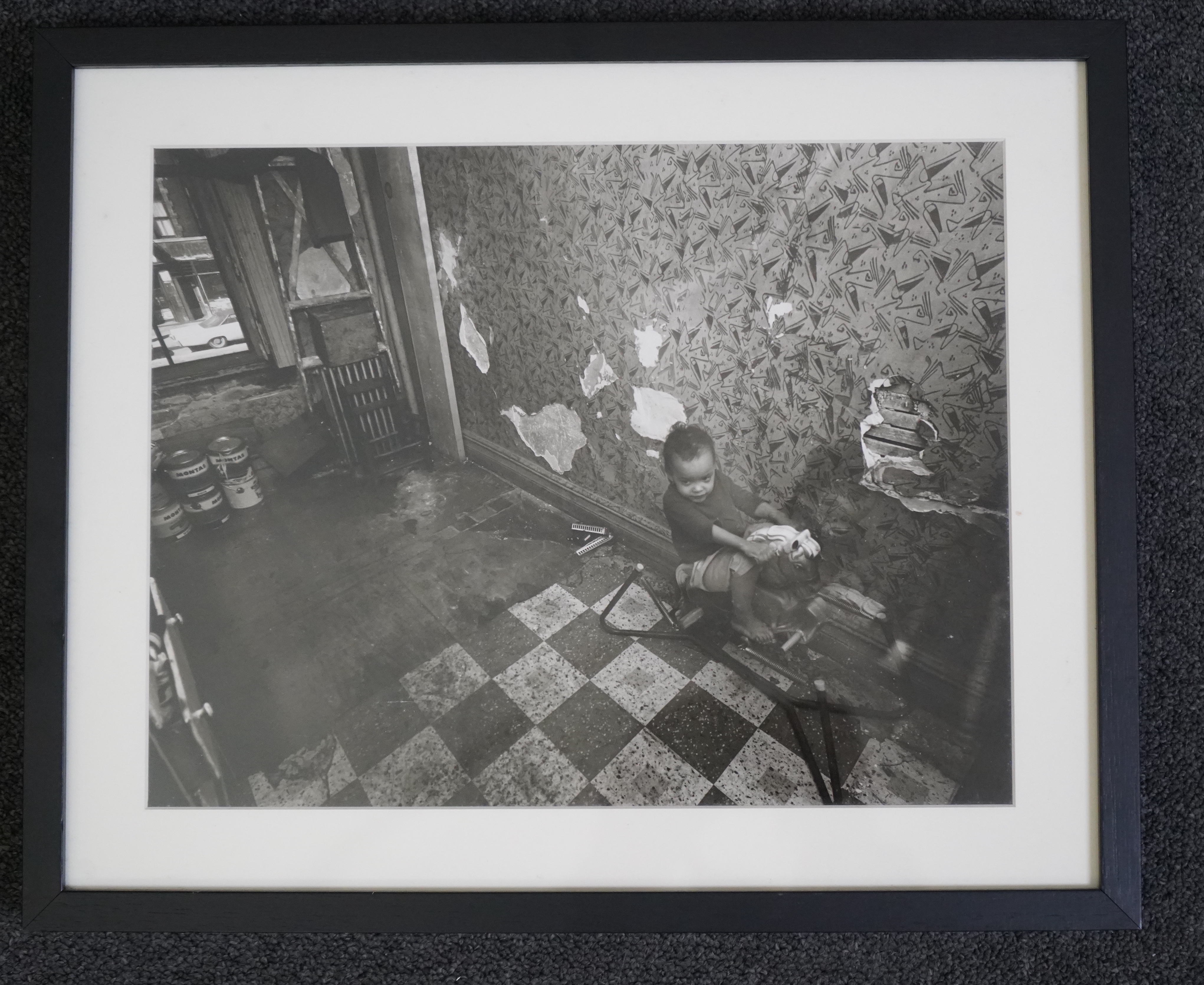 Bruce Davidson (American, b. 1933), Child on a rocking horse, from the Harlem Series, gelatin silver print, 26 x 33.5cm